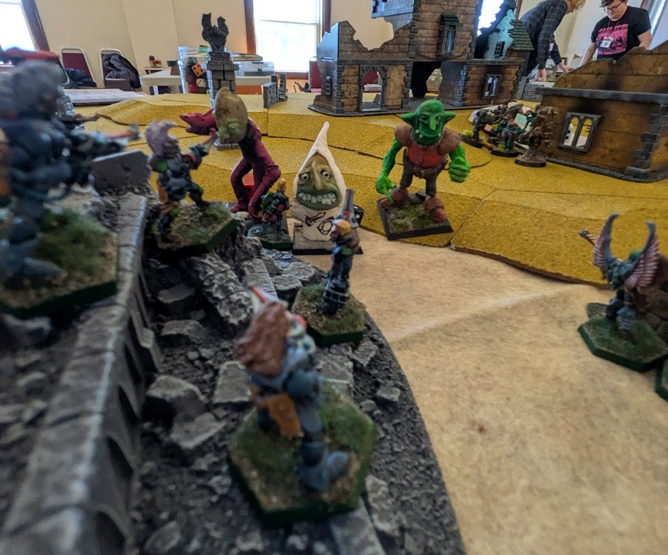 three of my orc sculpts approaching a unit of eldar