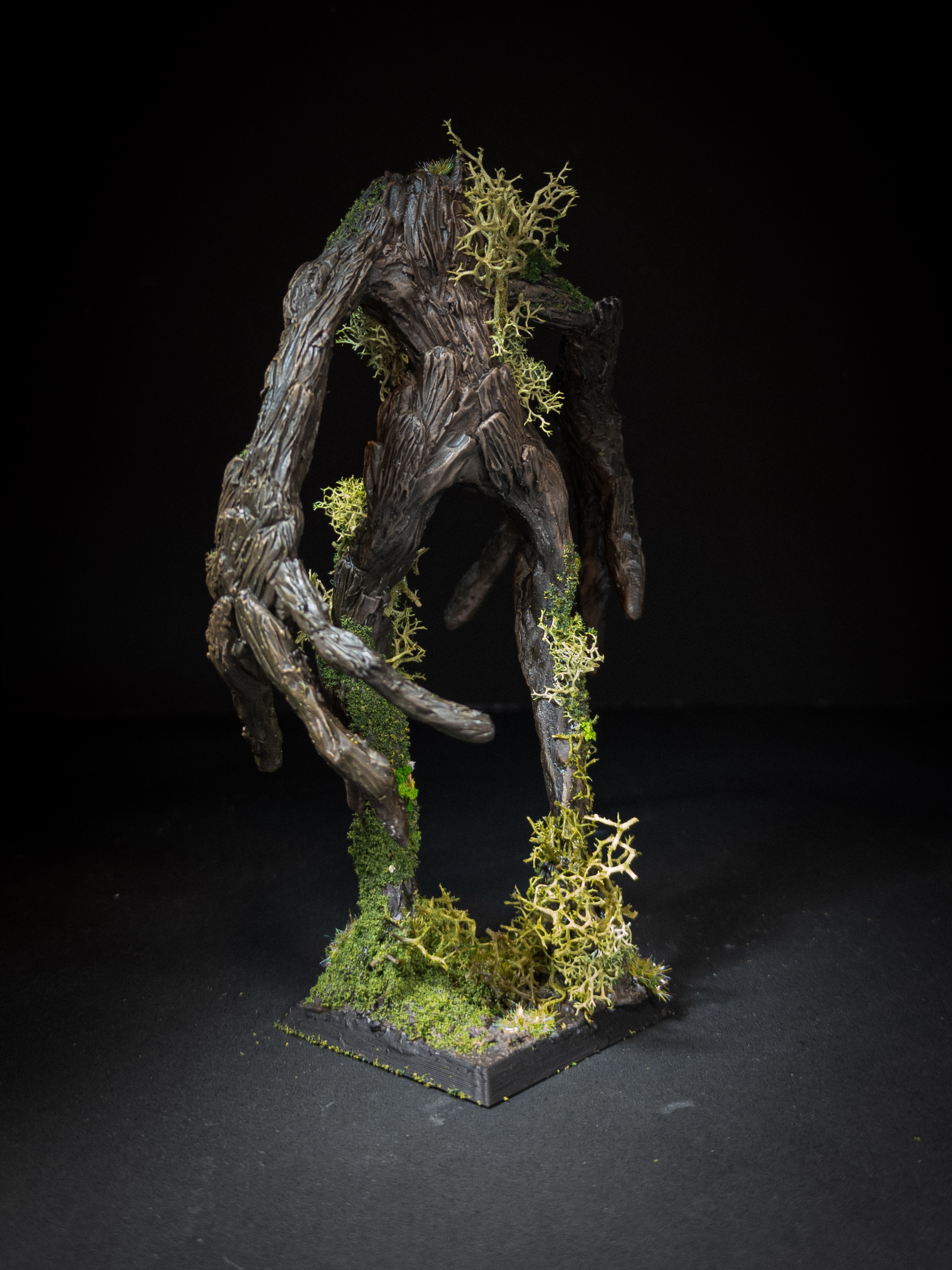 Mossy ent striding away the camera.