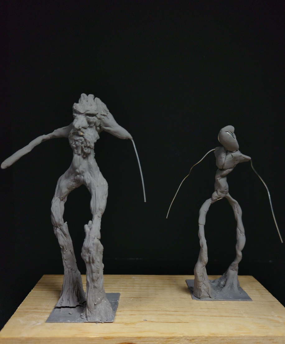 two grey ents on a board