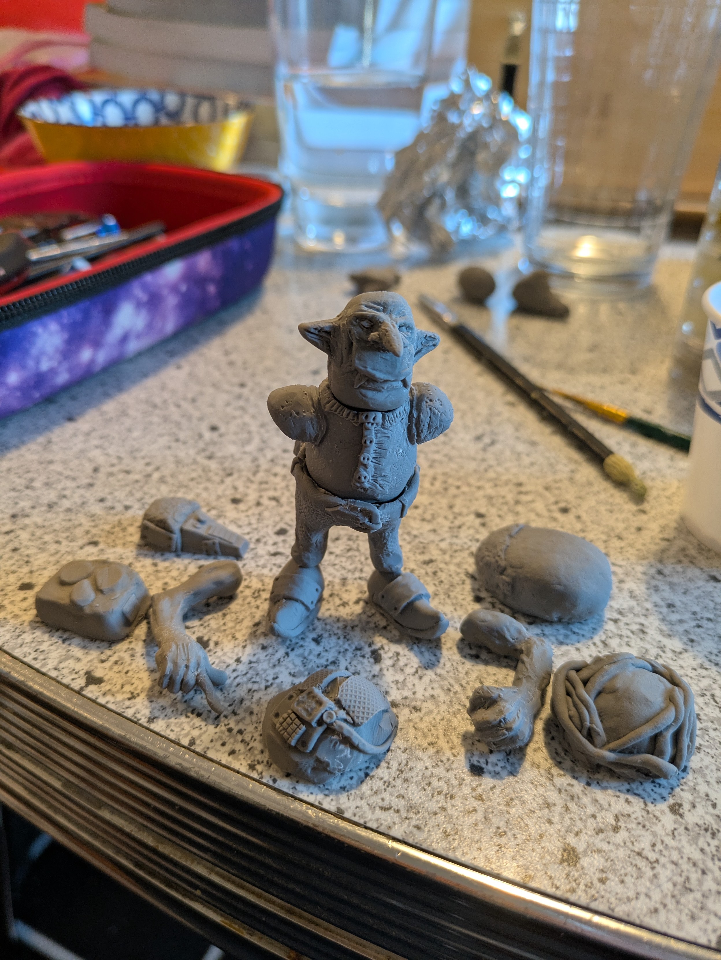 goblin with his arms and various chunks of stuff